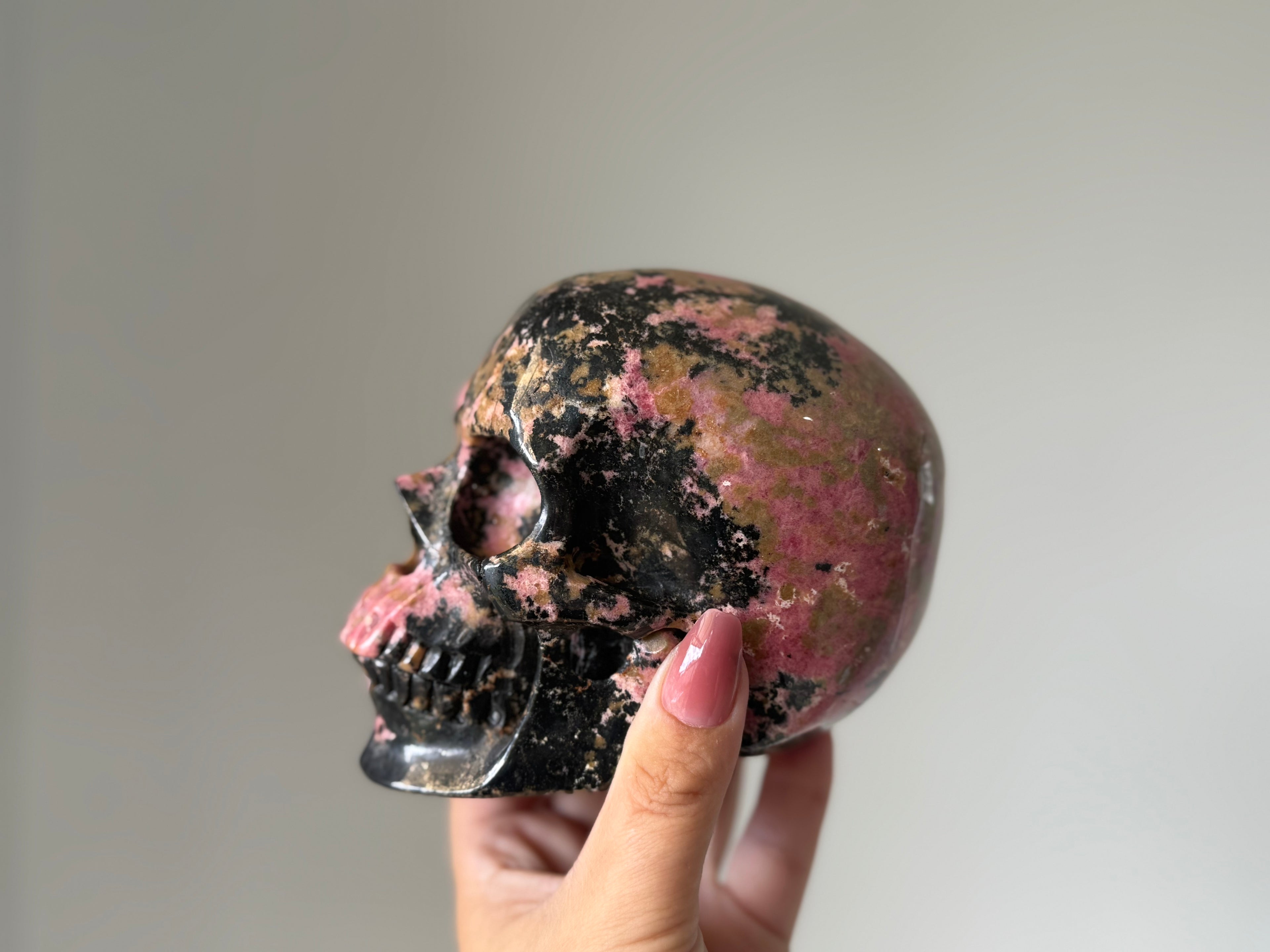 Rhodonite Crystal Skull Carving - for Emotional Healing, Heart Chakra & Grounded Love Energy