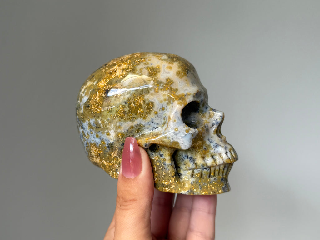 Golden Orbicular Jasper Skull Carving – Grounding Protection Stone for Strength, Stability & Earth Energy